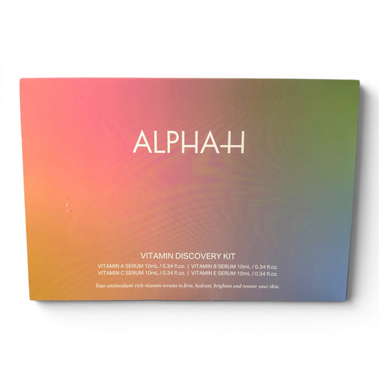 MuchMoreBeautyStore Alpha-H Vitamin Discovery Kit featuring 4 antioxidant-rich serums: A, B, C, and E. The packaging has a vibrant gradient of pink, orange, yellow, and green.
